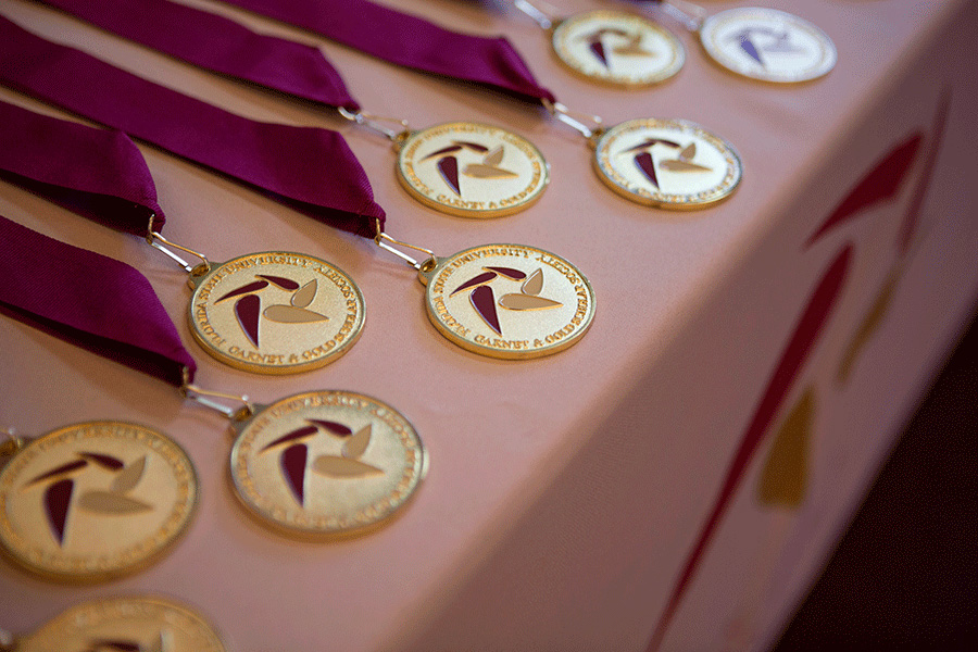 The fall 2022 Garnet & Gold Scholar induction ceremony medals